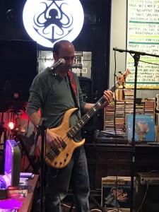 Most months, Doug plays the bass with the musical guest